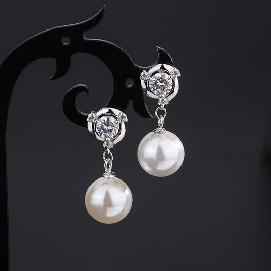 Diamond and pearl drop earrings